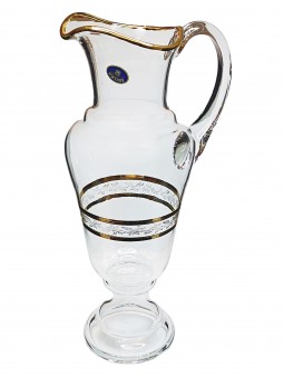 Tall glass jug with gold...