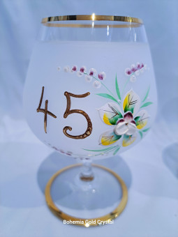 Birthday glass with hand...