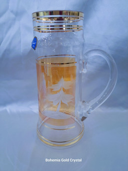 Smaller glass tankard with...