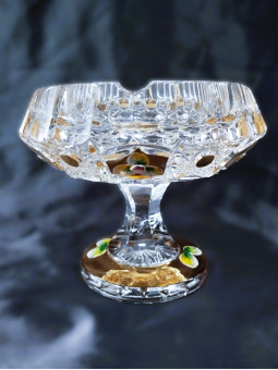 Cut beveled ashtray on a...